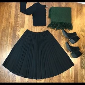 Black pleated midi skirt